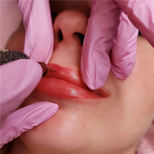 LM lip tattoo